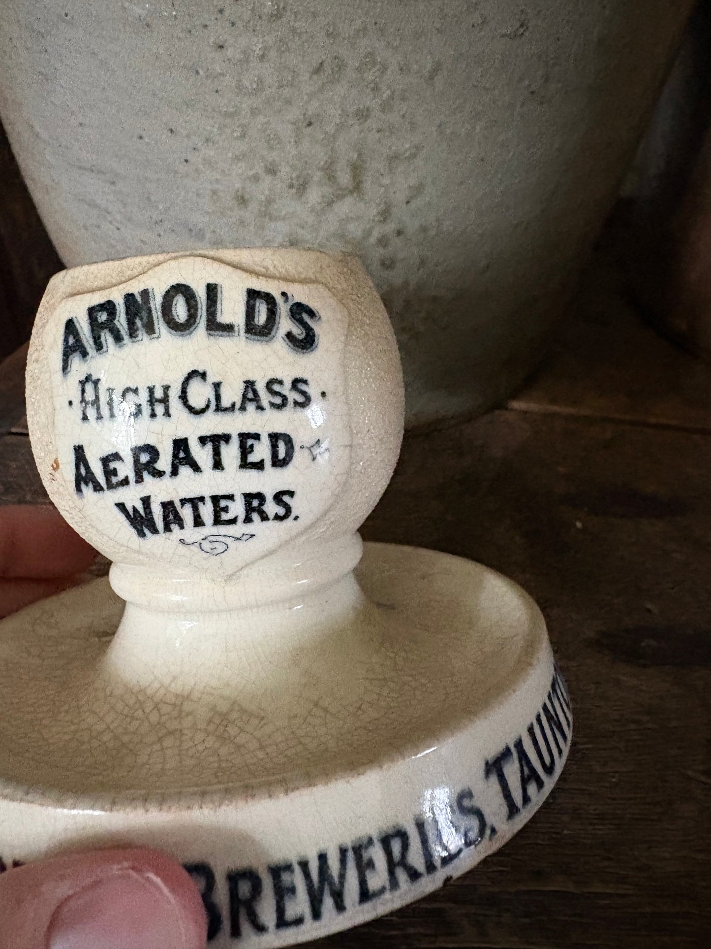 Antique advertising match strike and holder