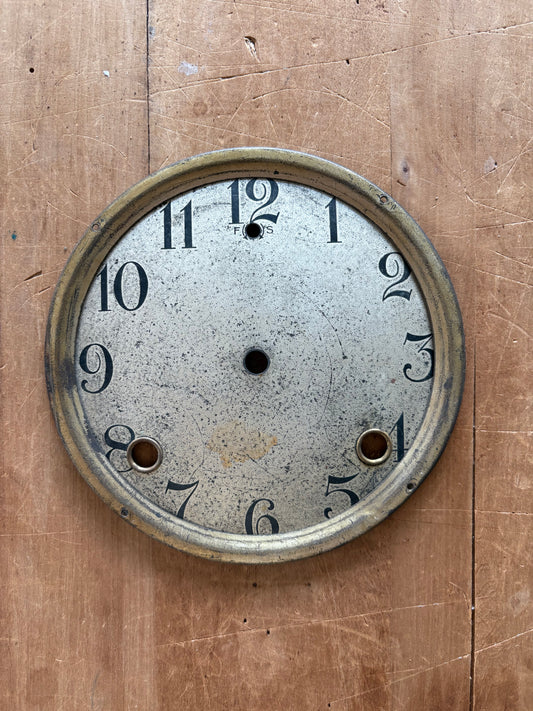 Vintage metal clock face
