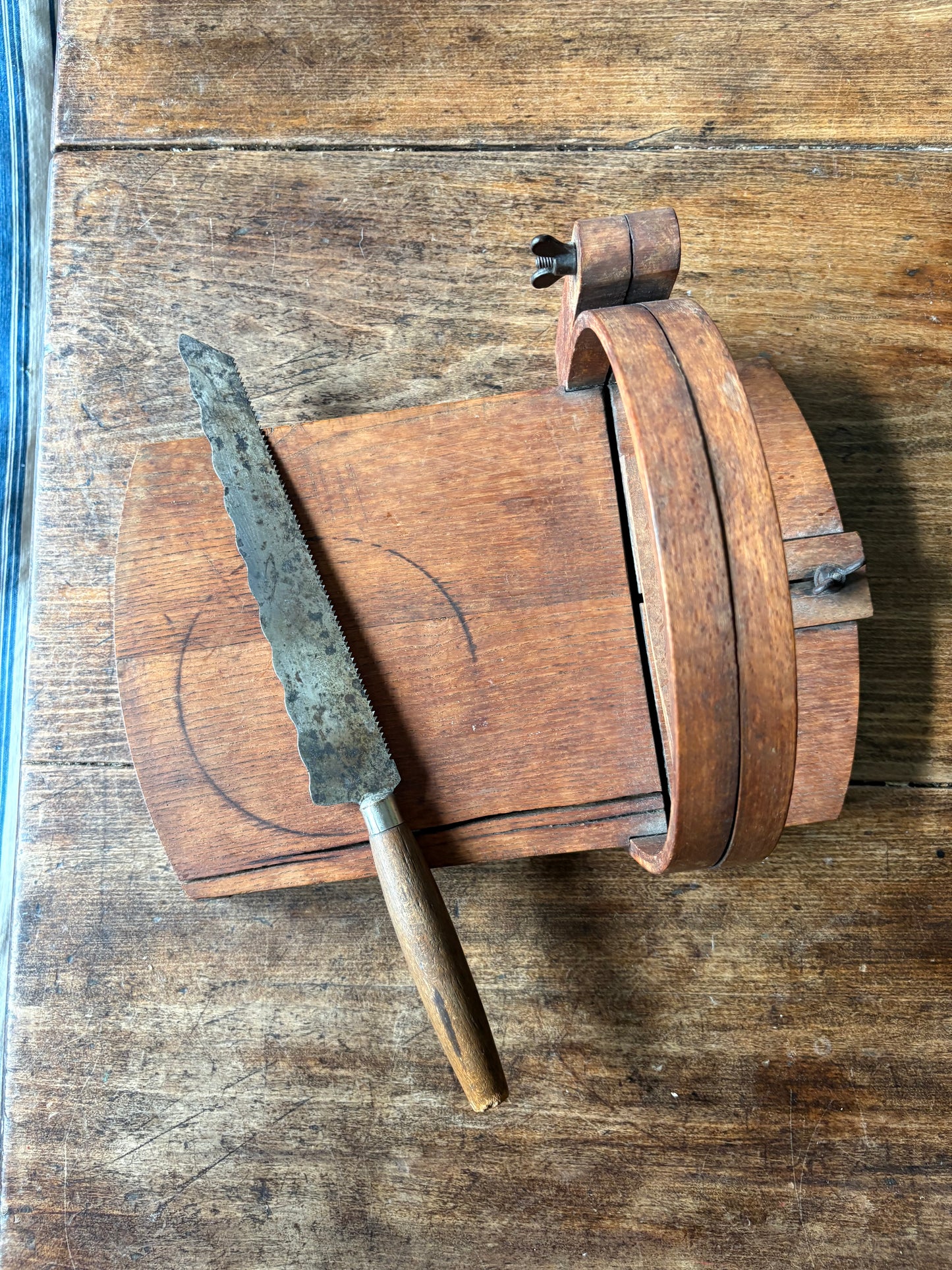 Antique wooden bread slicer with bread knife