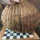 Antique primitive buttocks gathering basket