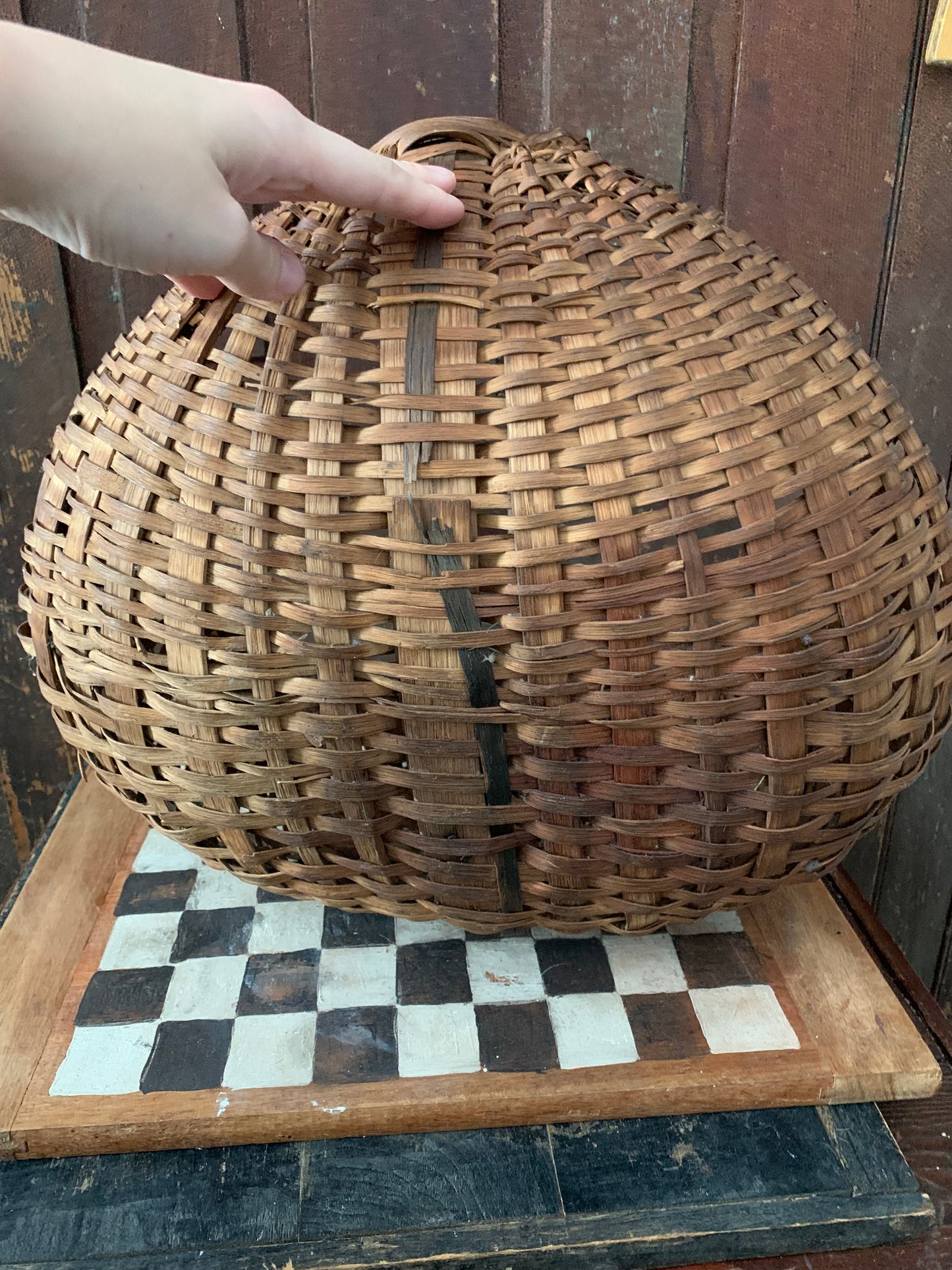 Antique primitive buttocks gathering basket