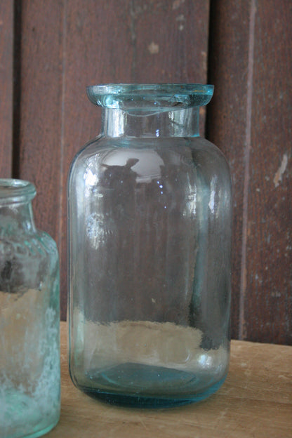 Antique early blue glass jars