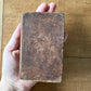 1831 second edition of "The New and Improved Camp Meeting Hymn Book” leather book
