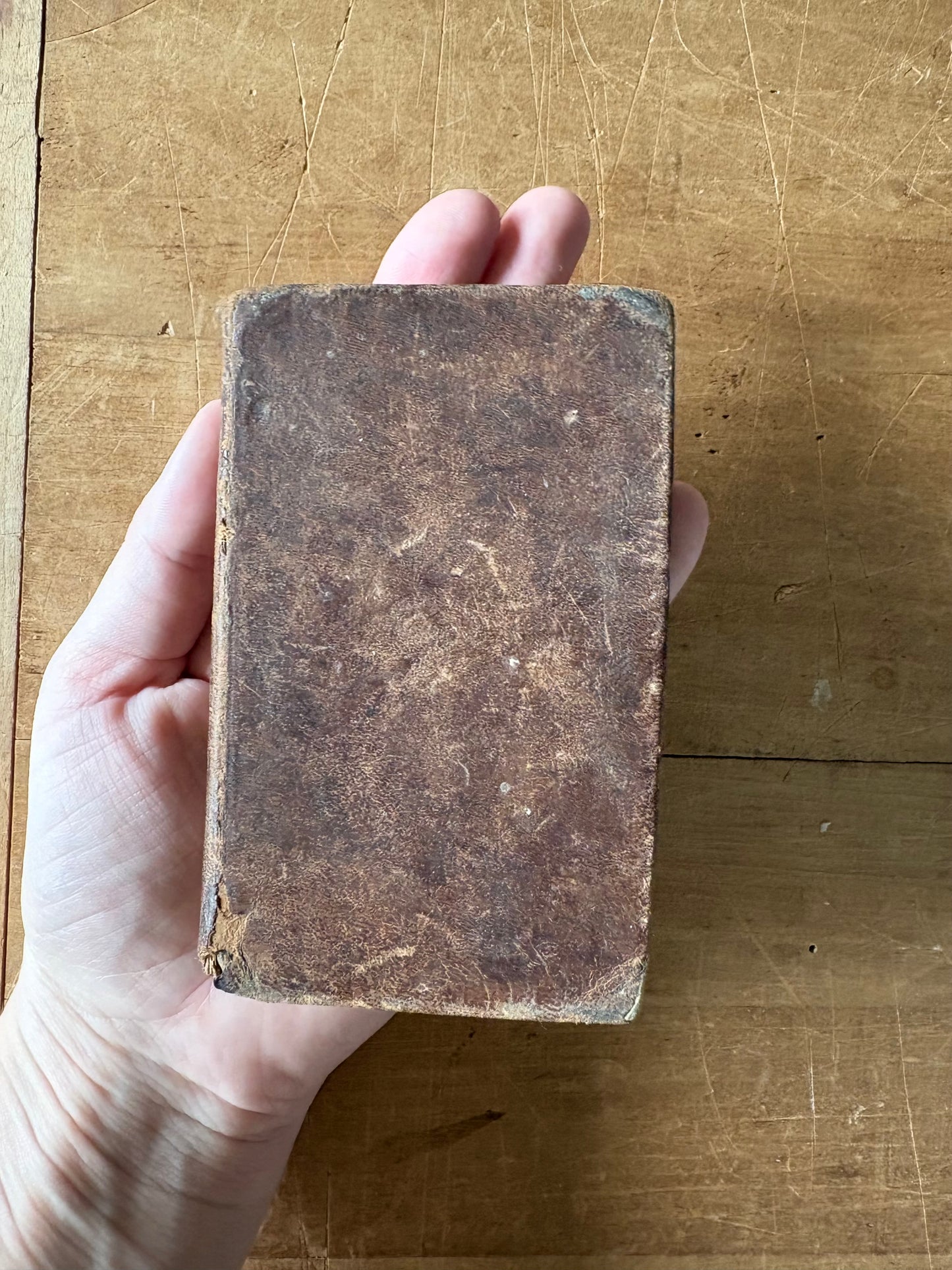 1831 second edition of "The New and Improved Camp Meeting Hymn Book” leather book