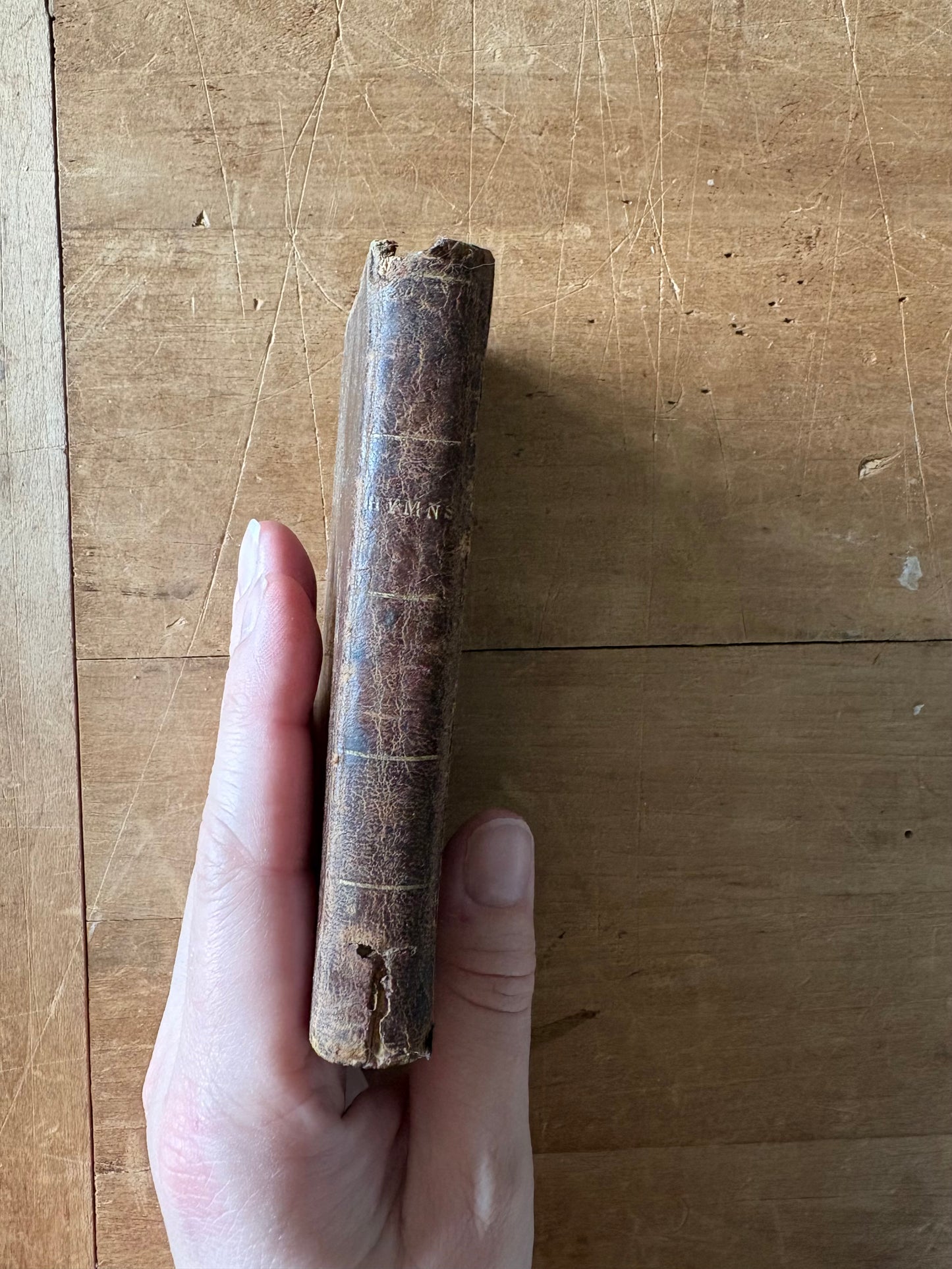 1831 second edition of "The New and Improved Camp Meeting Hymn Book” leather book
