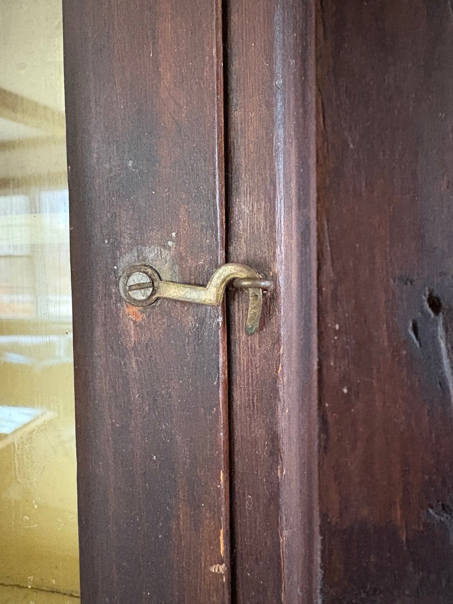 Antique early primitive wall cabinet with scallops