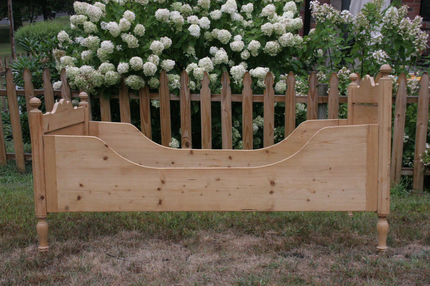 Antique English knotty pine sleigh bed | Twin
