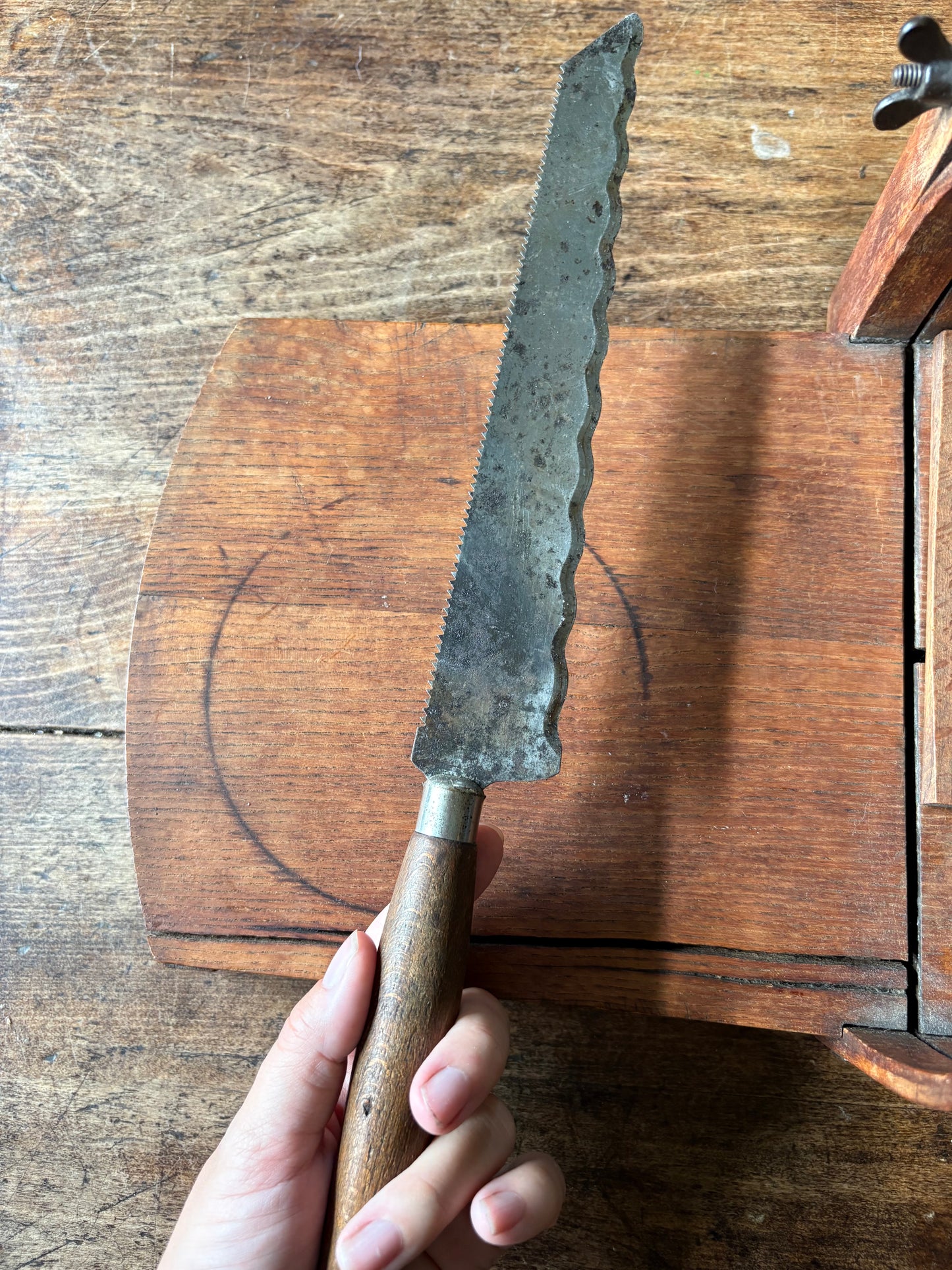 Antique wooden bread slicer with bread knife
