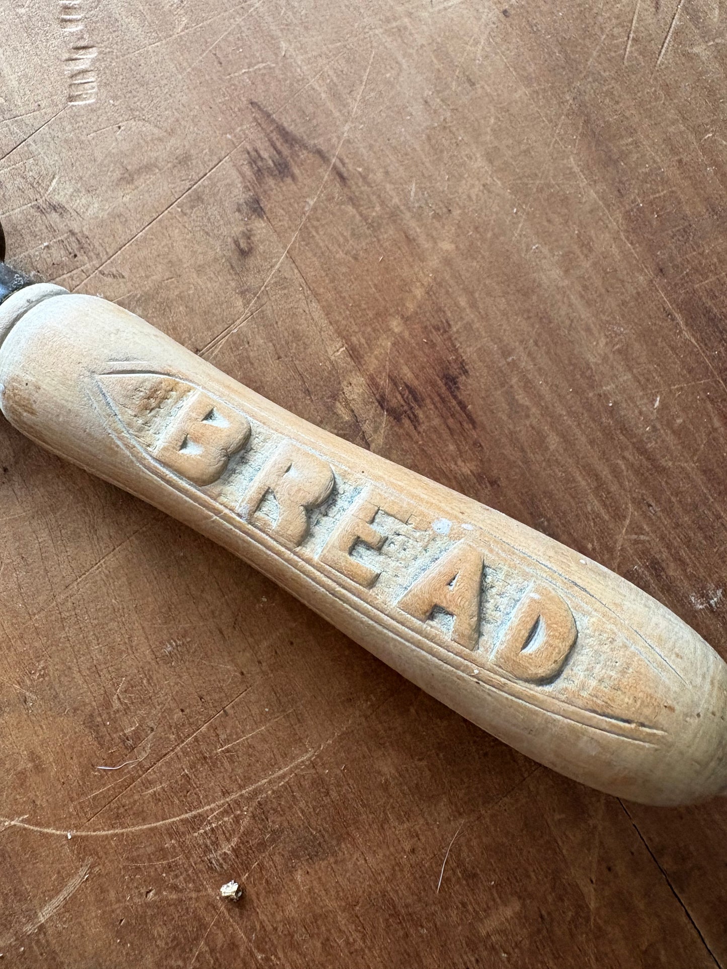 Antique wooden bread knife by Thomas Turner & Co. in Sheffield, England