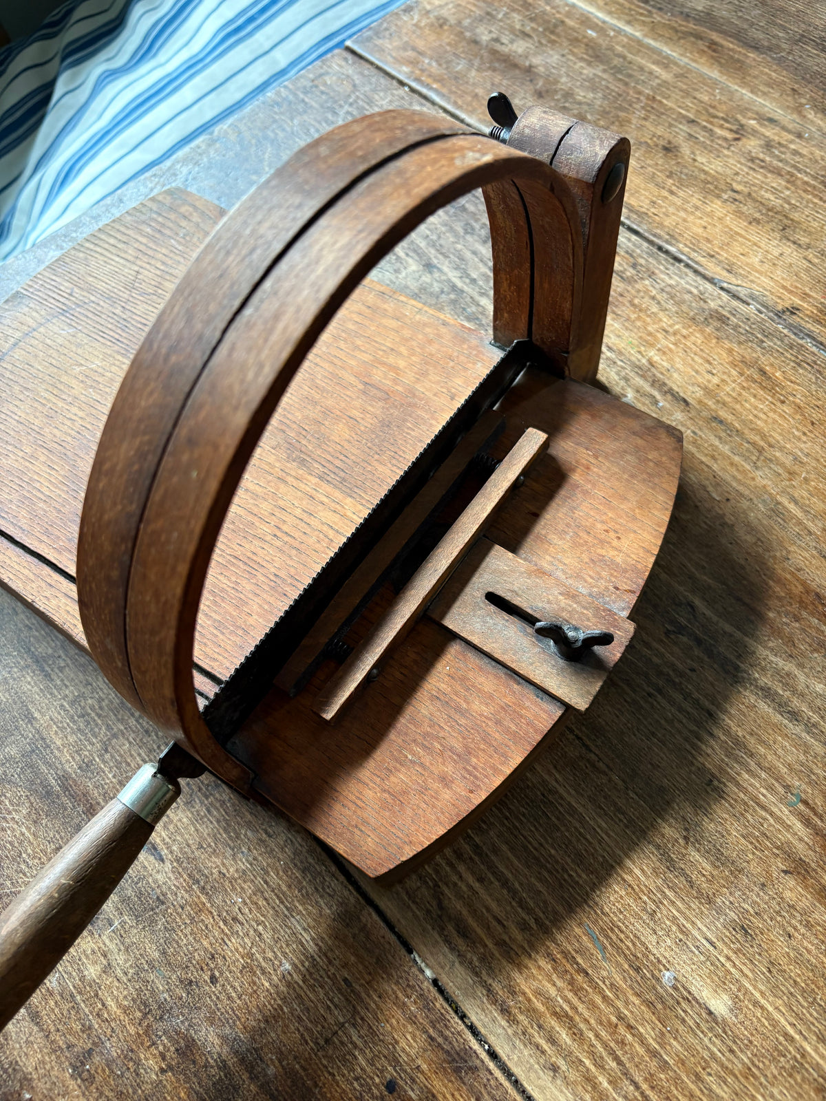 Antique wooden bread slicer with bread knife