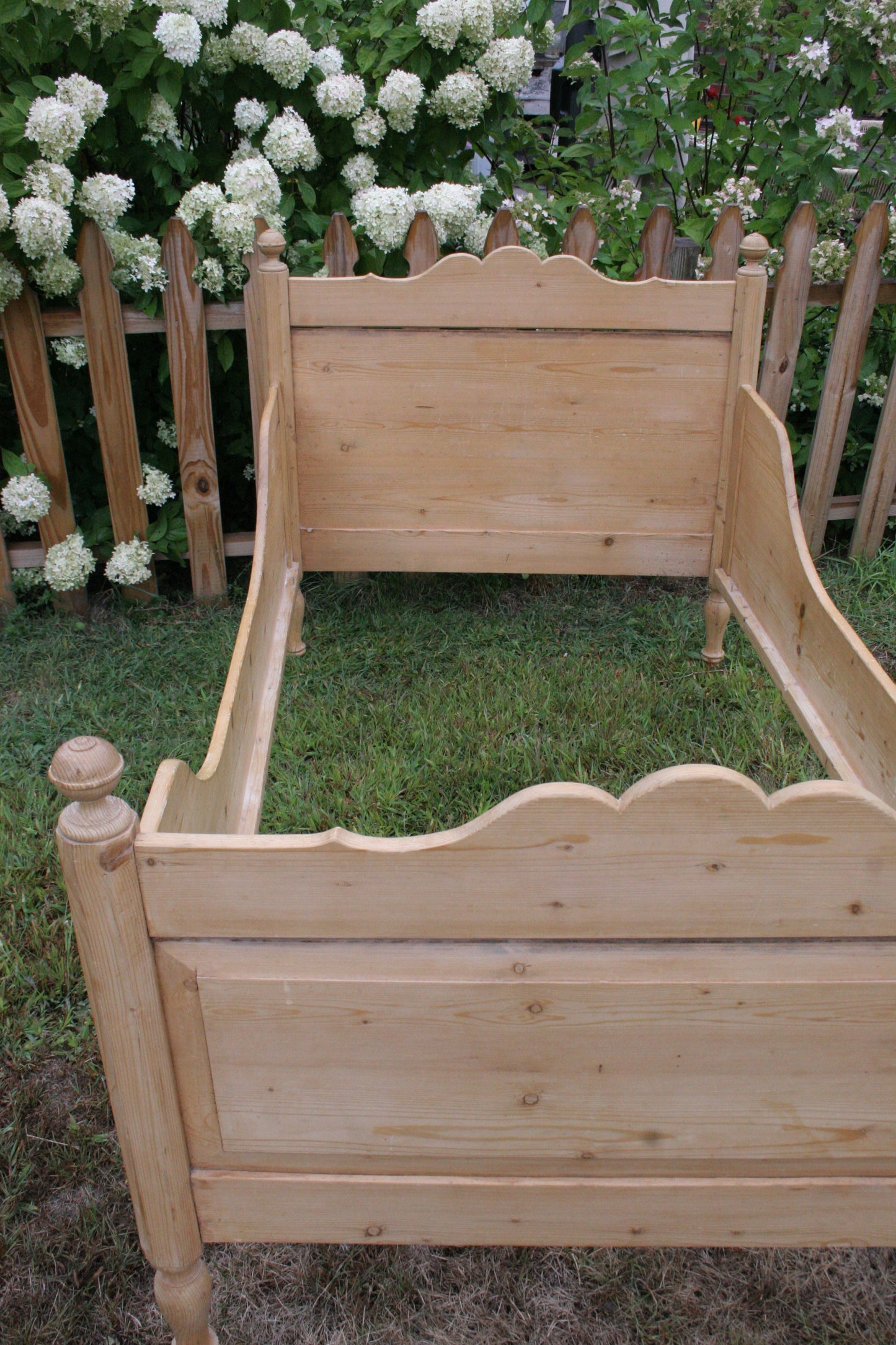 Antique English knotty pine sleigh bed | Twin