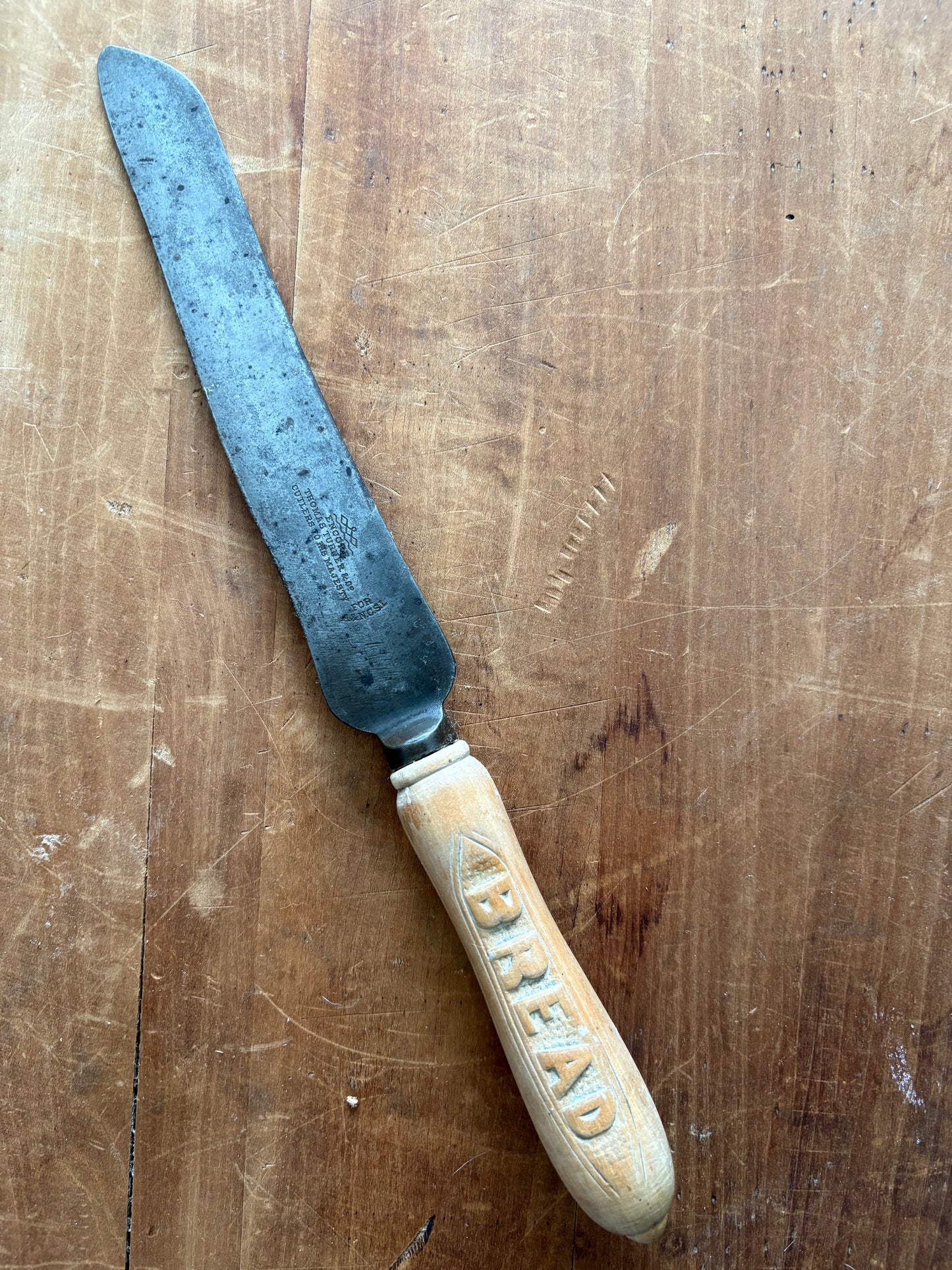 Antique wooden bread knife by Thomas Turner & Co. in Sheffield, England
