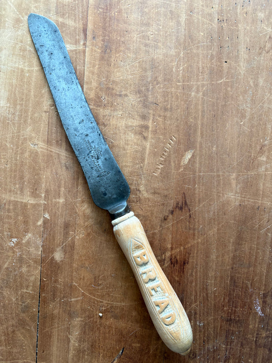 Antique wooden bread knife by Thomas Turner & Co. in Sheffield, England