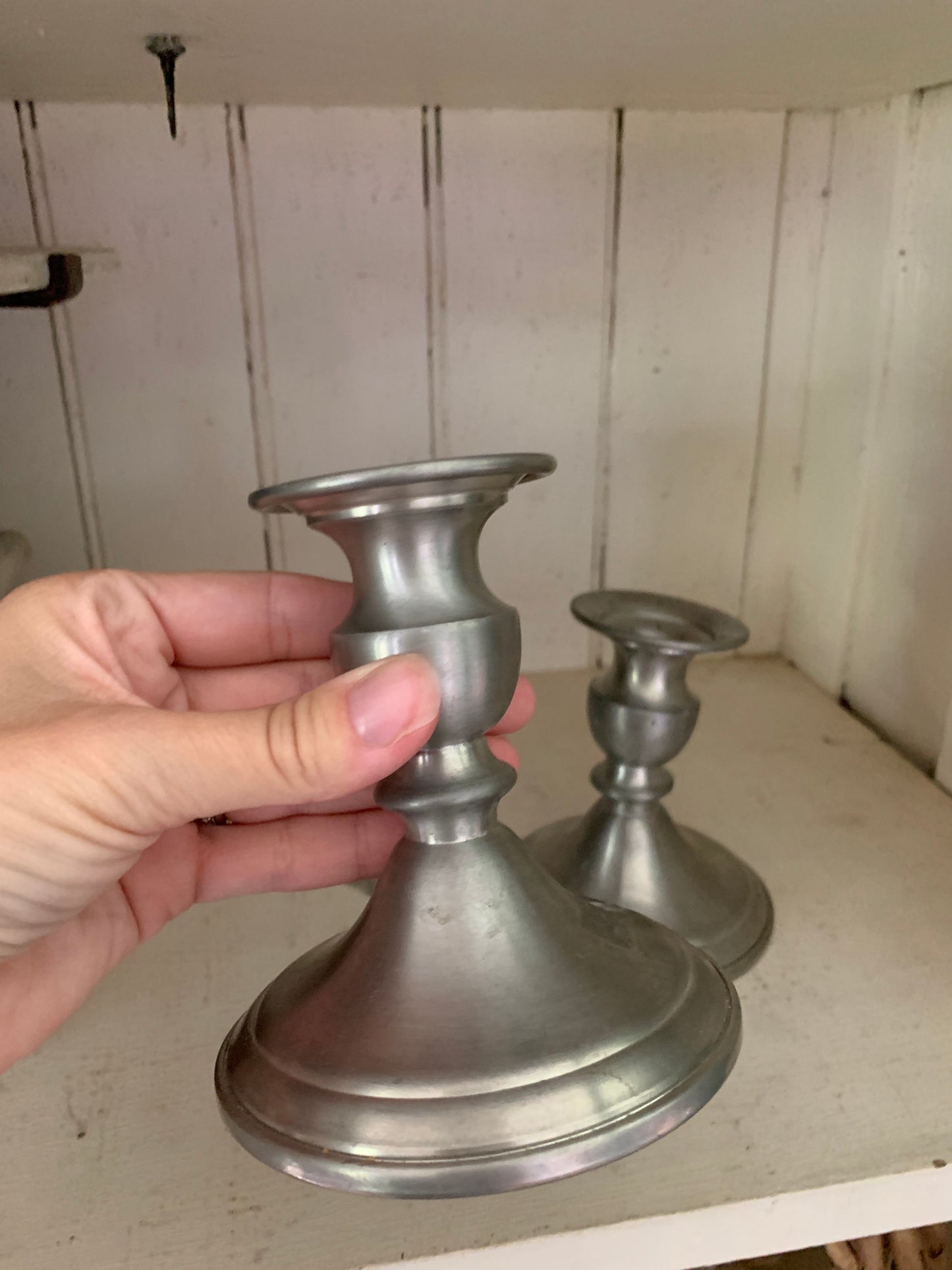 Antique pewter candlestick holder set