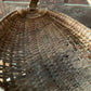Antique primitive buttocks gathering basket