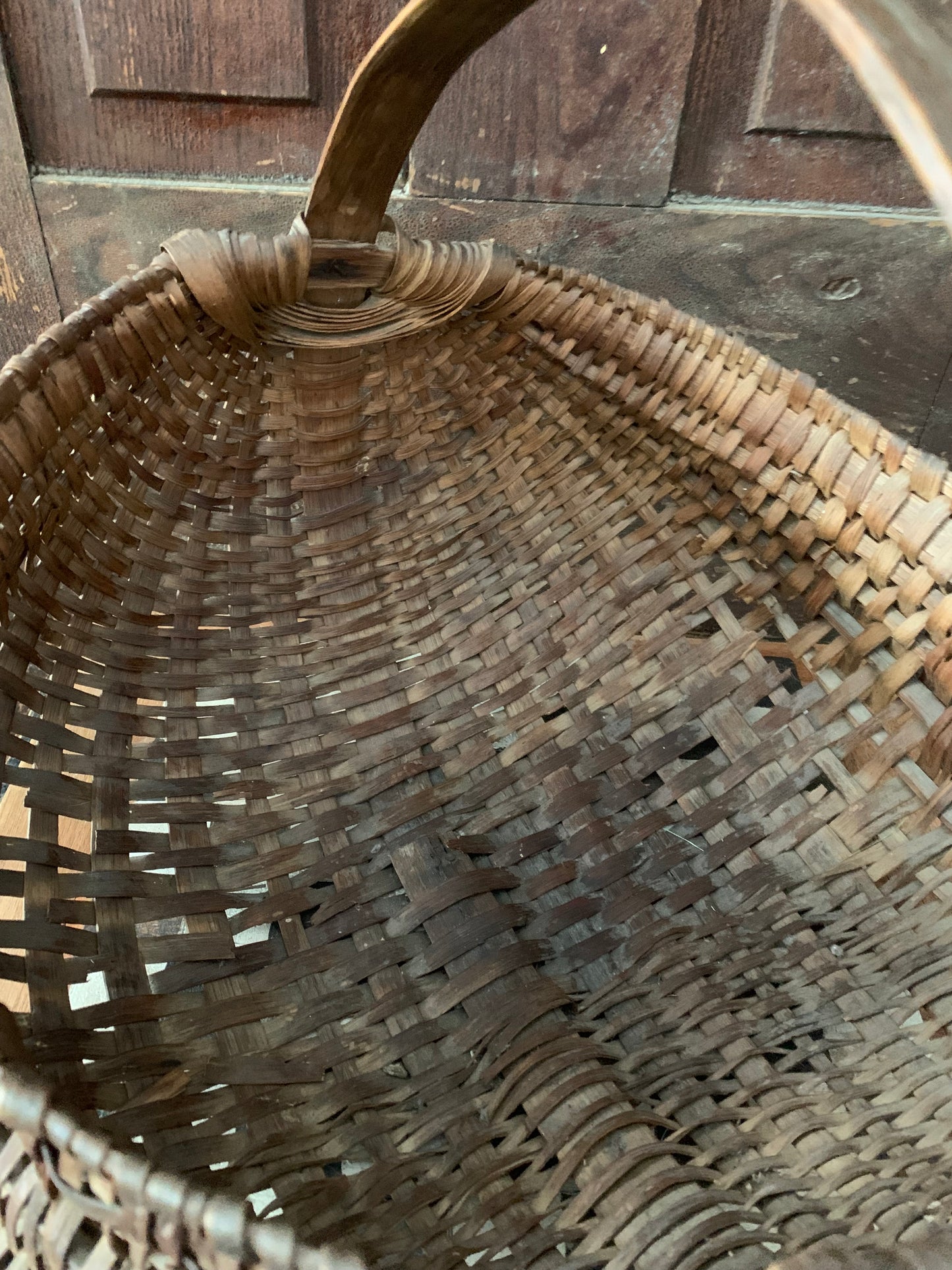 Antique primitive buttocks gathering basket