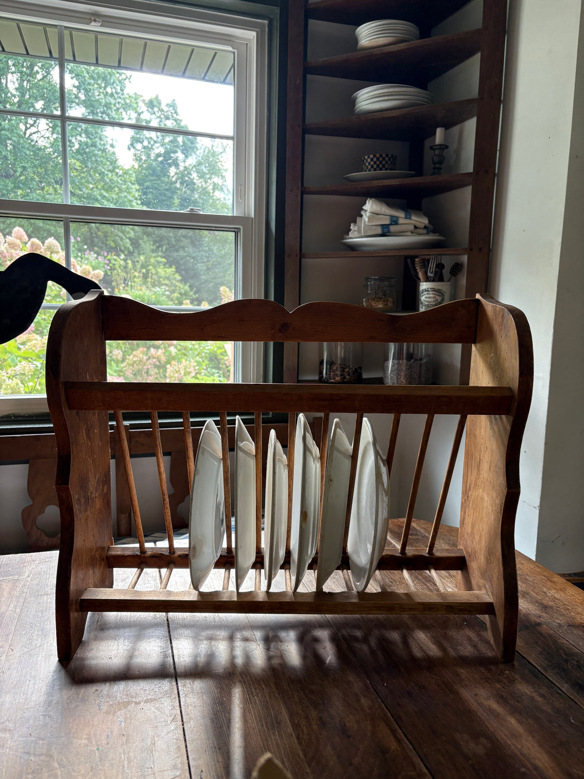 Vintage wooden wall plate rack with scallop detail