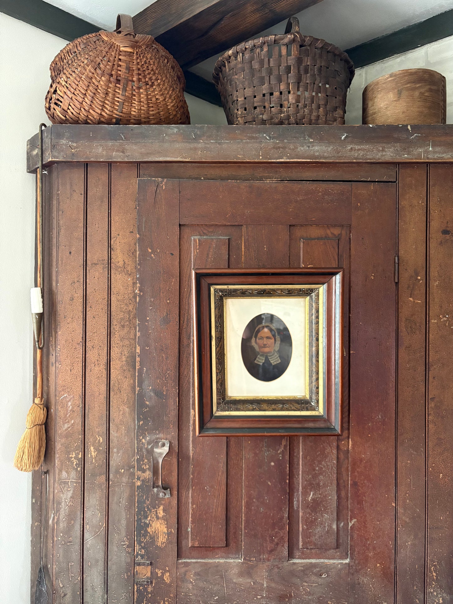 Antique oil painting of woman in frame