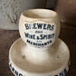 Antique advertising match strike and holder