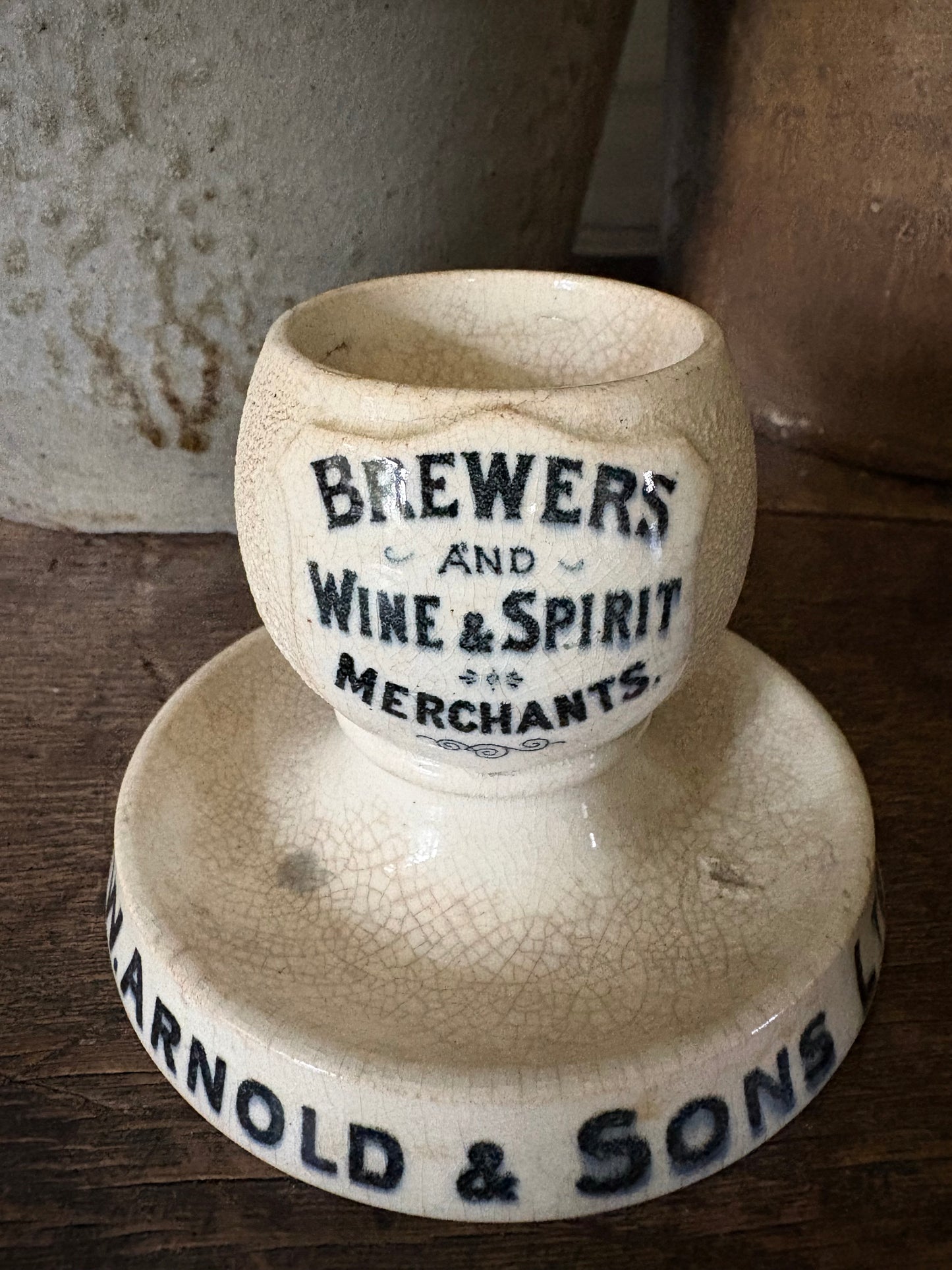 Antique advertising match strike and holder