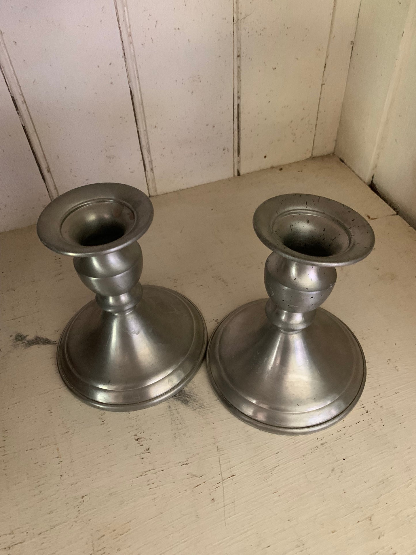 Antique pewter candlestick holder set