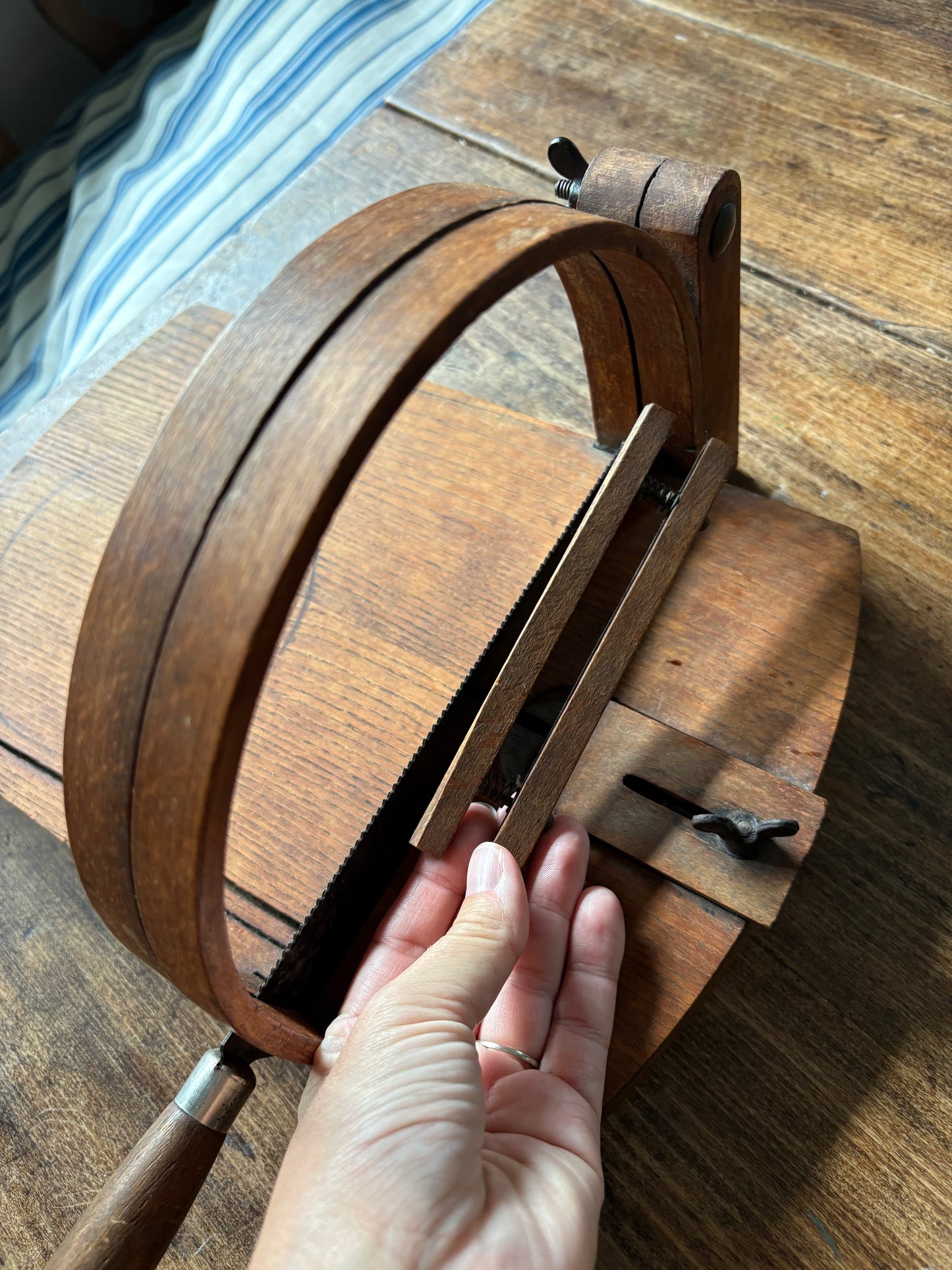 Antique wooden bread slicer with bread knife