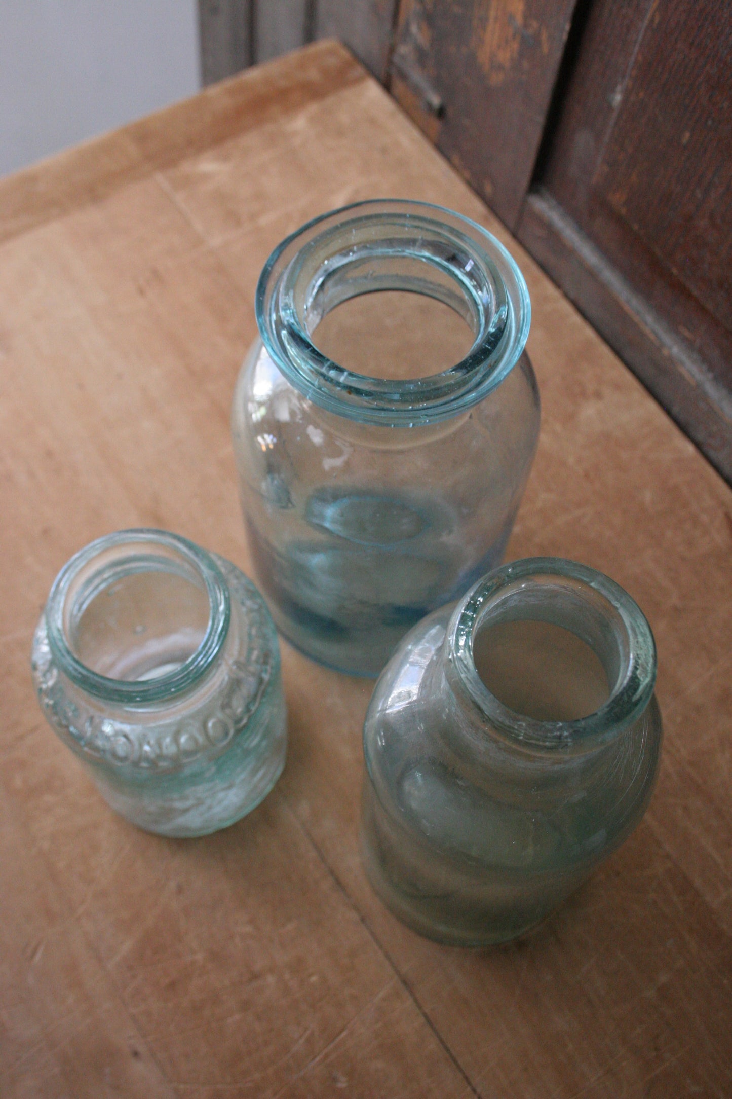 Antique early blue glass jars