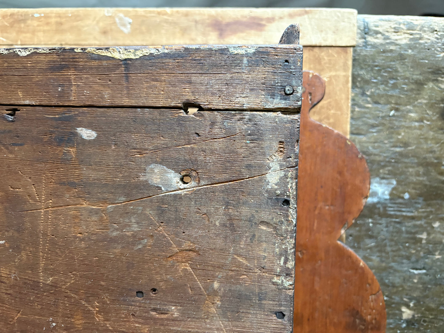 Antique early primitive wall cabinet with scallops