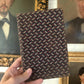 Antique early fabric covered school book