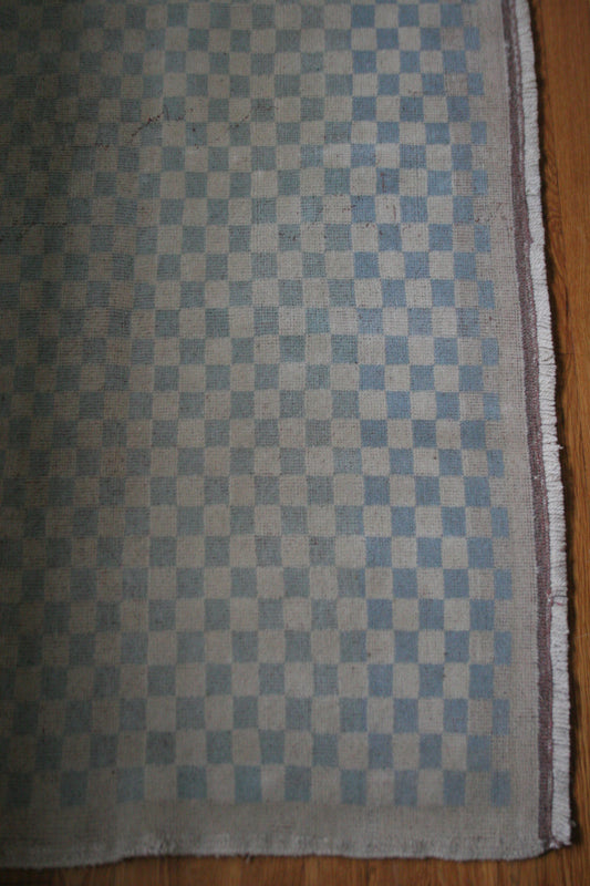 Antique checkered Turkish wool rug