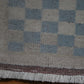 Antique checkered Turkish wool rug